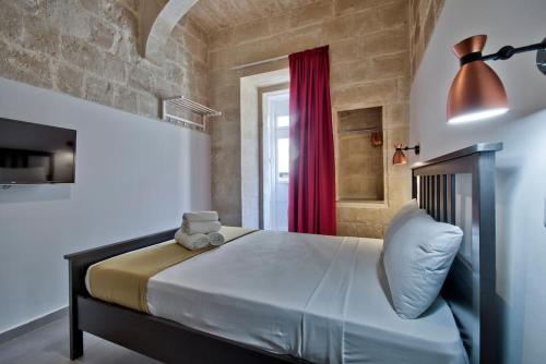 Old Lodge Apartment 4 by Vallettastay, Валетта (фото 10)