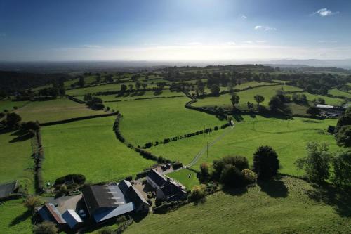 The Stables at Pentregaer Ucha, tennis court & lake