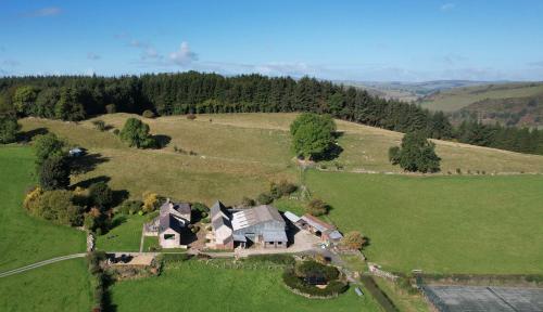 The Barn at Pentregaer Ucha, with tennis court and lake