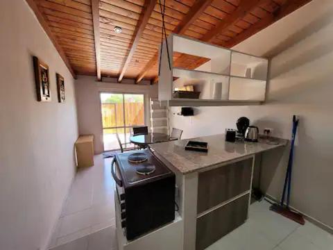 Kitchen, CORDOBA AEROPUERTO KEMPES QUORUM HOSPITAL ALLENDE PRIVADO Siglo XXI Universidad PASCAL Templo Mormon near Bavaria Restaurante Aleman