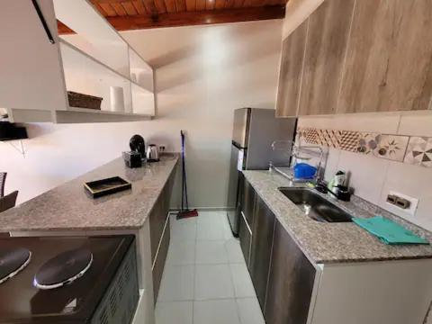Kitchen, CORDOBA AEROPUERTO KEMPES QUORUM HOSPITAL ALLENDE PRIVADO Siglo XXI Universidad PASCAL Templo Mormon near Bavaria Restaurante Aleman