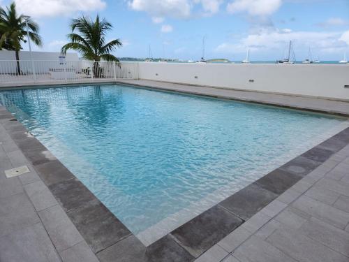 Beau duplex vue mer avec piscine et accès plage