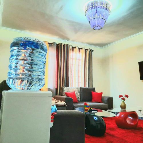 Bendra svetainė / televizorius, Cozy Nest-2 Bedroomed Apartment WiFi ,Netflix close to JKIA in Mlolongo