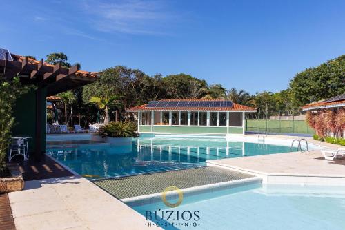 Zwembad, Casa alto padrao completa! Area Gourmet, cervejeira, 4 suites com ar, wi-fi, completa! in Vila Luiza