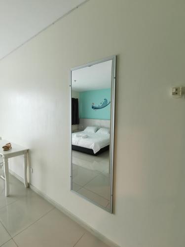 Peaceful 1-bedroom unit at Marina Island by JoMy Homestay