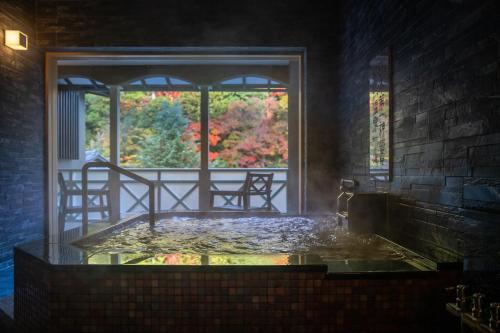 Deluxe Suite with Private Hot Spring & Sauna -