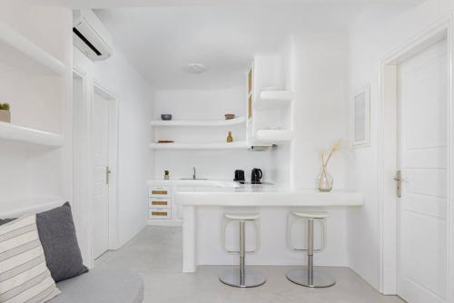 Koumi Homes Mykonos - Tap to explore photos