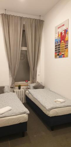 FlyFly Hostel , darmowy parking , rezerwuj przez urządzenia mobilne -10 procent, Breslau (Foto 11)