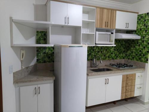 B101 AP com Cozinha, Churrasqueira privativa , e internet banda larga, na beira do Lago Corumbá (AP do LAGO, com Churrasqueira privativa , cozinha , internet no ap, rampa barco e jet, pesqueiro - B) in Res. Alto da Boa Vista