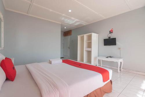 RedDoorz near Farm House 4 Room Type - Standard Double Room