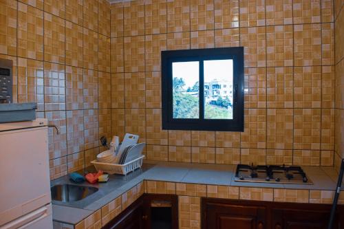 Kitchen, Residence Deluxe in Yaounde