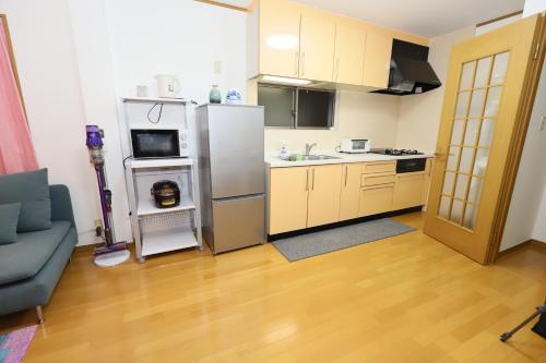 Kitchen, Guest House Kubo Homes Matsu in Osaka