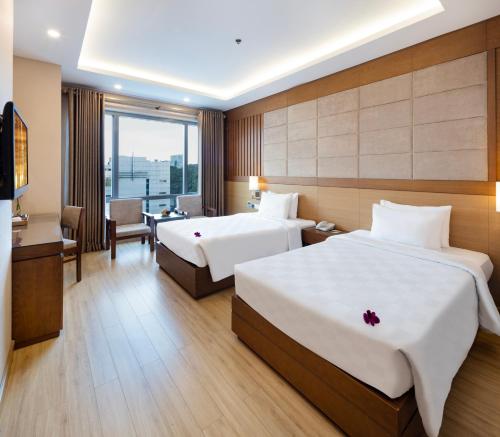 Eden Star Saigon Hotel Room Type - Premium Deluxe Twin with Window - Free Mini Bar Eden Star Saigon Hotel Room Type - Premium Deluxe Twin with Window - Free Mini Bar
