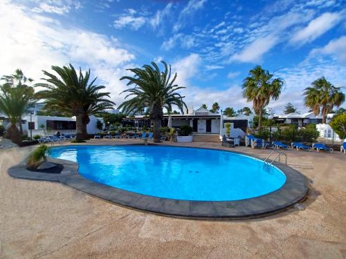 Bungalow Playa Bastian - Piscina climatizada - Wifi - Playa 1 min.