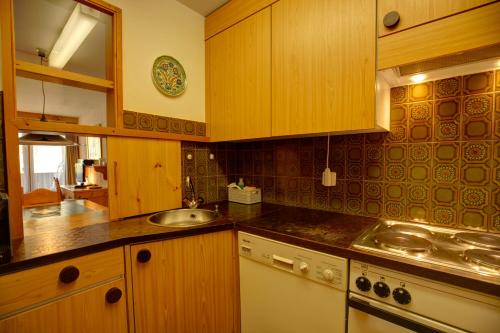 Kitchen, Chesa Munteratsch 1 1 2-Zimmerwohnung 204 Typ D in Silvaplana