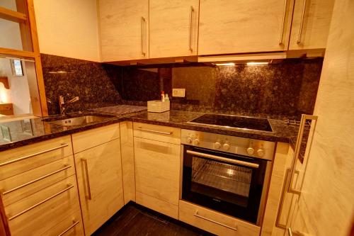 Kitchen, Chesa Munteratsch 1 1 2-Zimmerwohnung 304 Typ D in Silvaplana