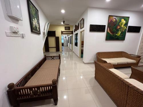 Shared lounge/TV area, Sevenseas Seaview Homestay in Taman Samudra