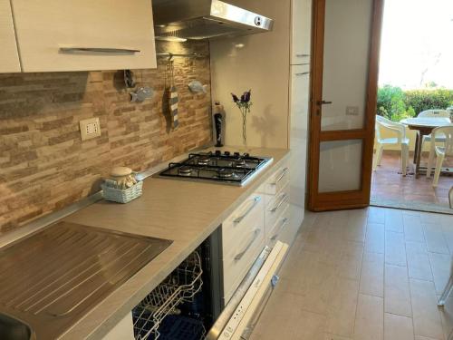  Cosy holiday home in Isola Rossa with garden in Cascabraga