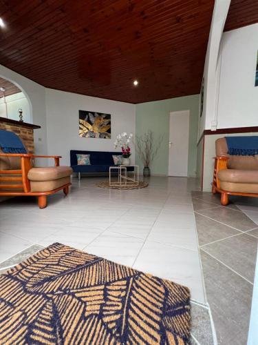 gedeelde lounge/tv-ruimte, Poseidon in Le Lamentin