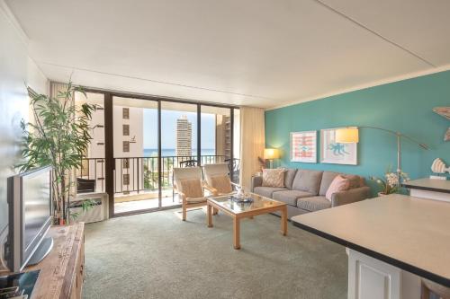 Modern 12th Floor Waikiki Banyan Condo with Partial Ocean Views - main image