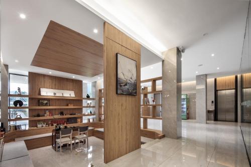 ห้องส่วนกลางสำหรับนั่งเล่น/ดูทีวี, Lanshan Moon Resort in บิ๊ก บันยัน ทรี