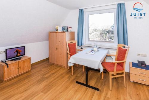 Haus Deichgraf 177 - Wohnung 7 in Юйст