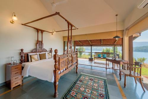 SaffronStays Anantham - 3BR Pet-Friendly Kerala-Style Lakefront Villa with Verandah & Views in Kamshet