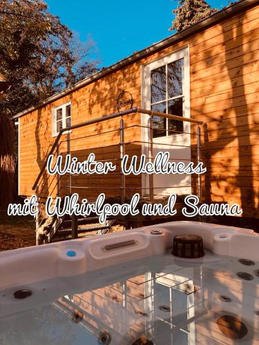 B&B Petershagen - Zirkuswagen mit Outdoor Whirlpool und Garten - Bed and Breakfast Petershagen