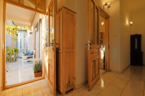 ティミショアラ Old town Boheme Apartment 4つ星 シングルルーム レストラン