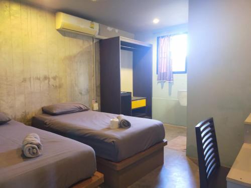ห้องมาตรฐานเตียงแฝด (Standard Twin Room)