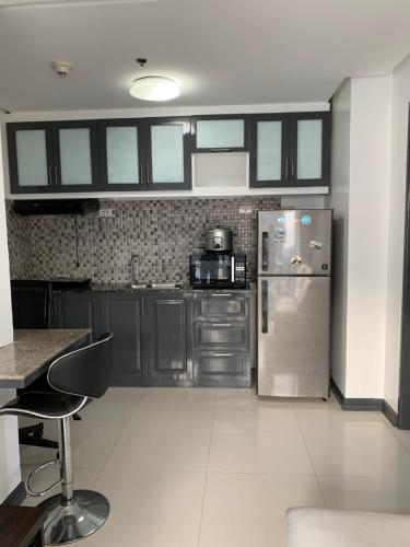 Kitchen, 1 BR with balcony, fully furnished overlooking Manila Bay at Birch Tower, Malate, Manila near Old Swiss Inn