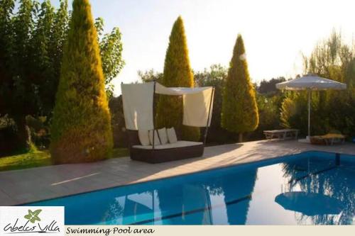 Abelos Villa (views, garden and private pool*)