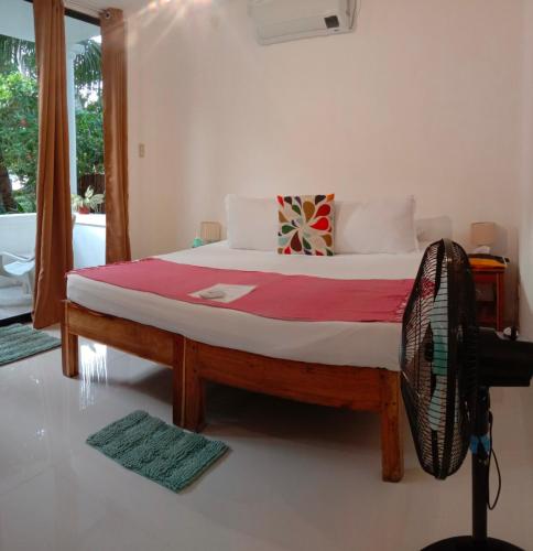 Corong Beach Resort Room Type - Deluxe Double Room with Balcony and Sea View