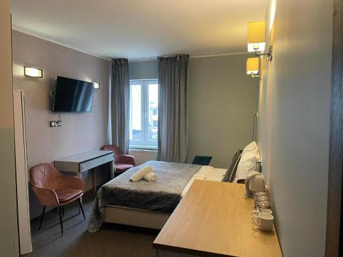 Rynek 14 - Pokoje hotelowe - Cafe&Restaurant - Parking - OrangeTV, Inowrocław (zdjęcie 6)
