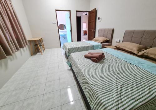 Air-home No 9 Kampung Boyan, 4BR, 9pax, Netflix Air-home No 9 Kampung Boyan, 4BR, 9pax, Netflix