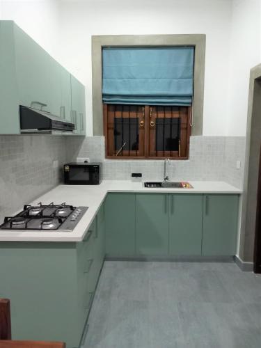 Kitchen, Li's Apartment in Kalalgoda