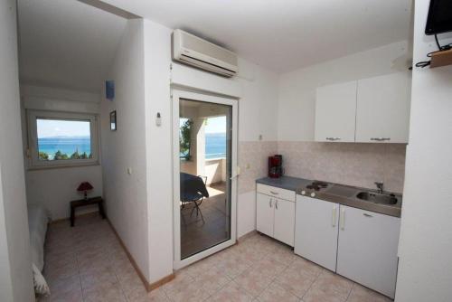 Studio Apartment in Duce with sea view, Balcony, Klimaanlage, WLAN 132-1, Duče (fotografie 8)