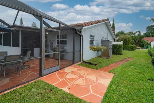 Three Bedroom Pool Home with Modern Interior Design in Coral Springs (FL)