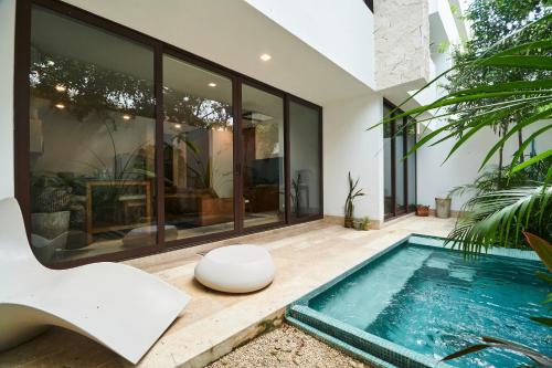 Omara 2-BR Pool · Tropical 2-BR Condo With Private Pool + Amenities! - Tap to explore photos