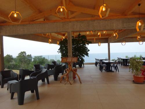 Restaurant, Camping Mozziconaccio in Conca