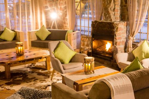 gedeelde lounge/tv-ruimte, Elegant Desert Lodge in Sesriem