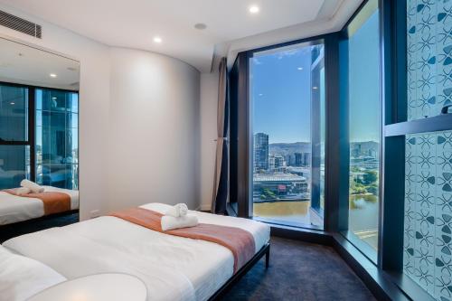 CASSA ONE - The One Apartments Managed by The Cassa Room Type - Two-Bedroom Apartment with Partial River View