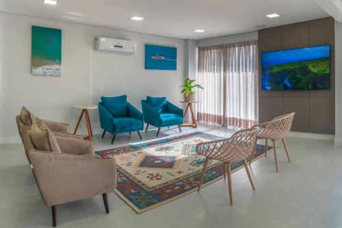 ห้องส่วนกลางสำหรับนั่งเล่น/ดูทีวี, Express Floripa Residence in ฟลอเรียนโนโปลิส