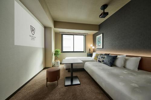 Standard Twin - Prosecco Beds in L-Shape (3-7 Floor) room in The Royal Park Canvas Ginza Corridor