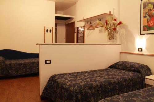 Camera tripla, 3 letti