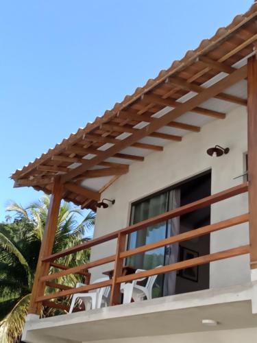 Erkély/terasz, Suíte Ilhinha II em condomínio na Praia do Perequê (Suite Ilhinha II em condominio na Praia do Pereque) in Centro Commercial