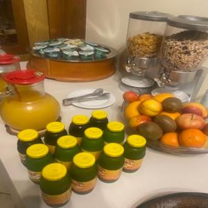 a kitchen counter filled with lots of different types of fruit, Hotel Giampy in Assergi