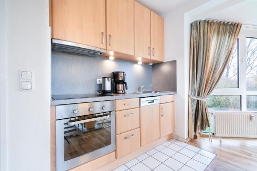 кухня, Wohnpark am Mühlenteich - Appartement 34 (Wohnpark am Muhlenteich - Appartement 34) in Тимендорфен Странд