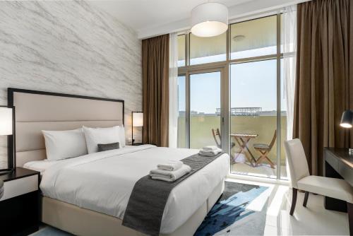 Vacay lettings - Upgraded studio at Damac tower JVC, Дубай