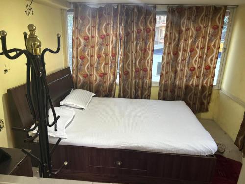 Double or Twin Room with Balcony room in Sudha’s Garden Home